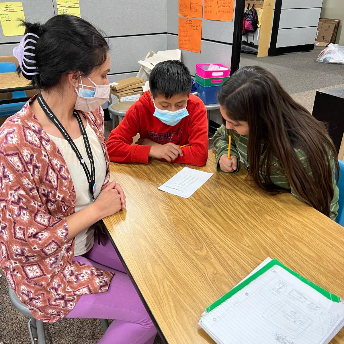  A staff member assists a student